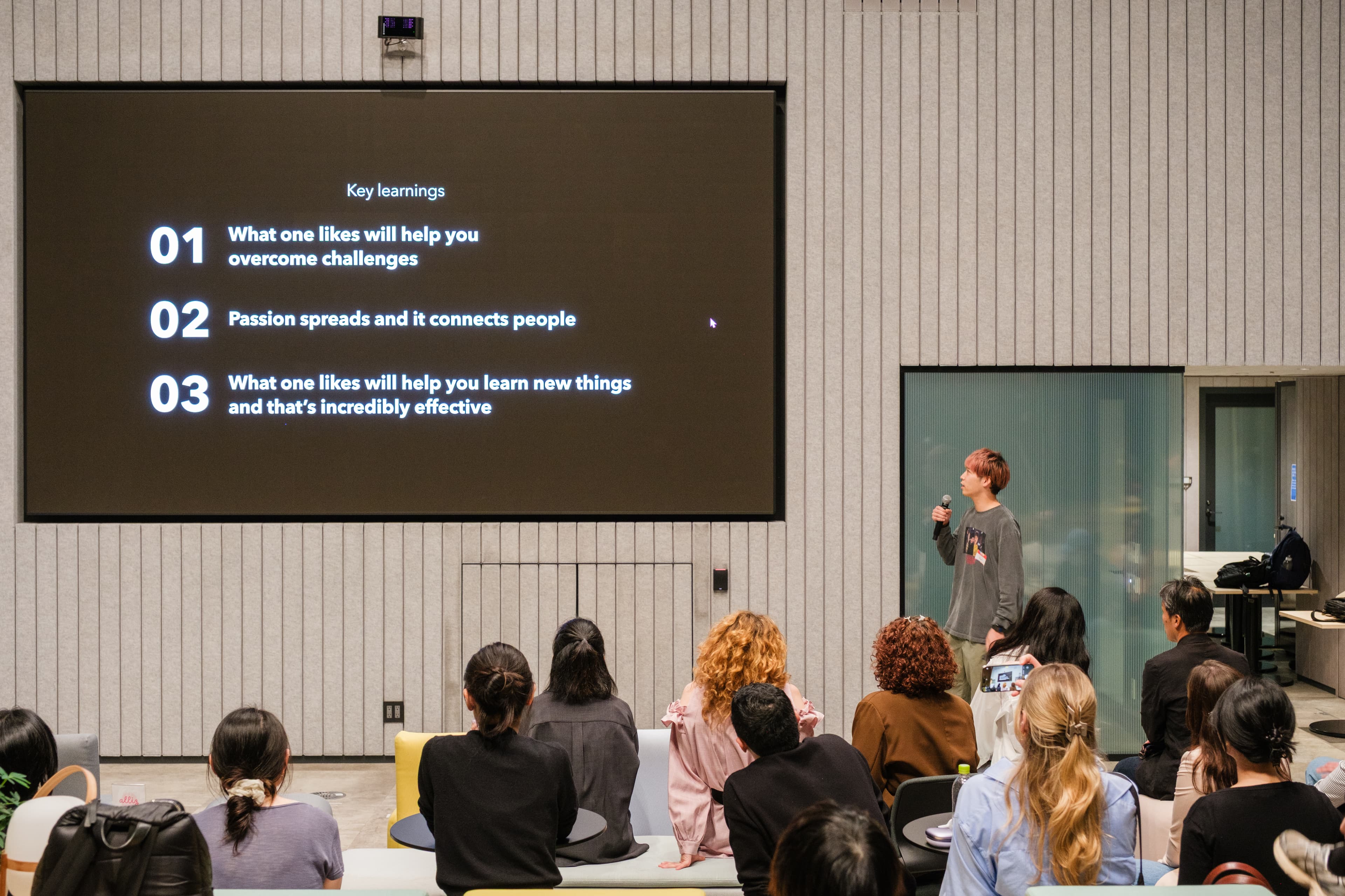 Masaki Haruta speaking to an audience