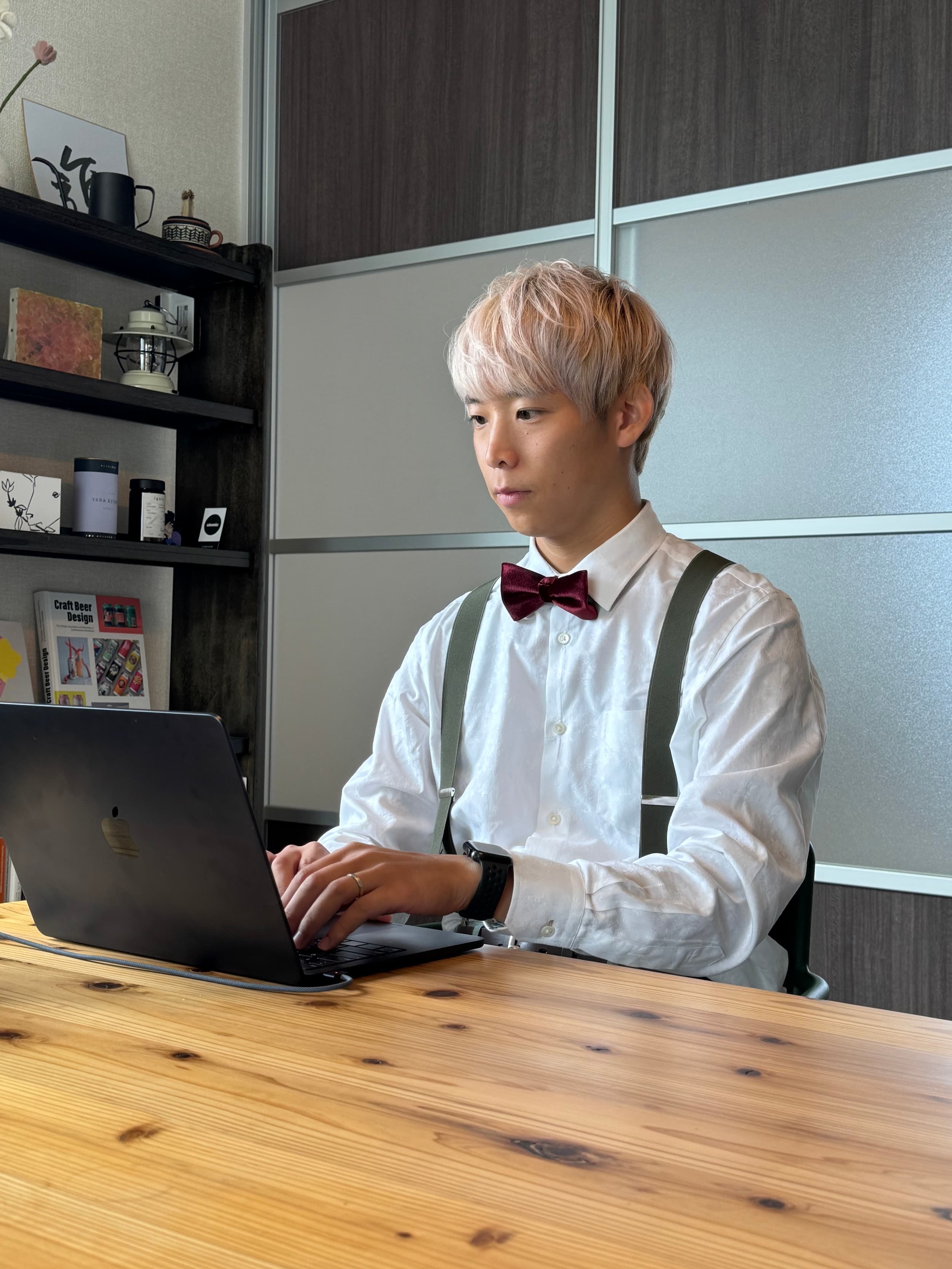 Masaki Haruta building a digital product on a laptop