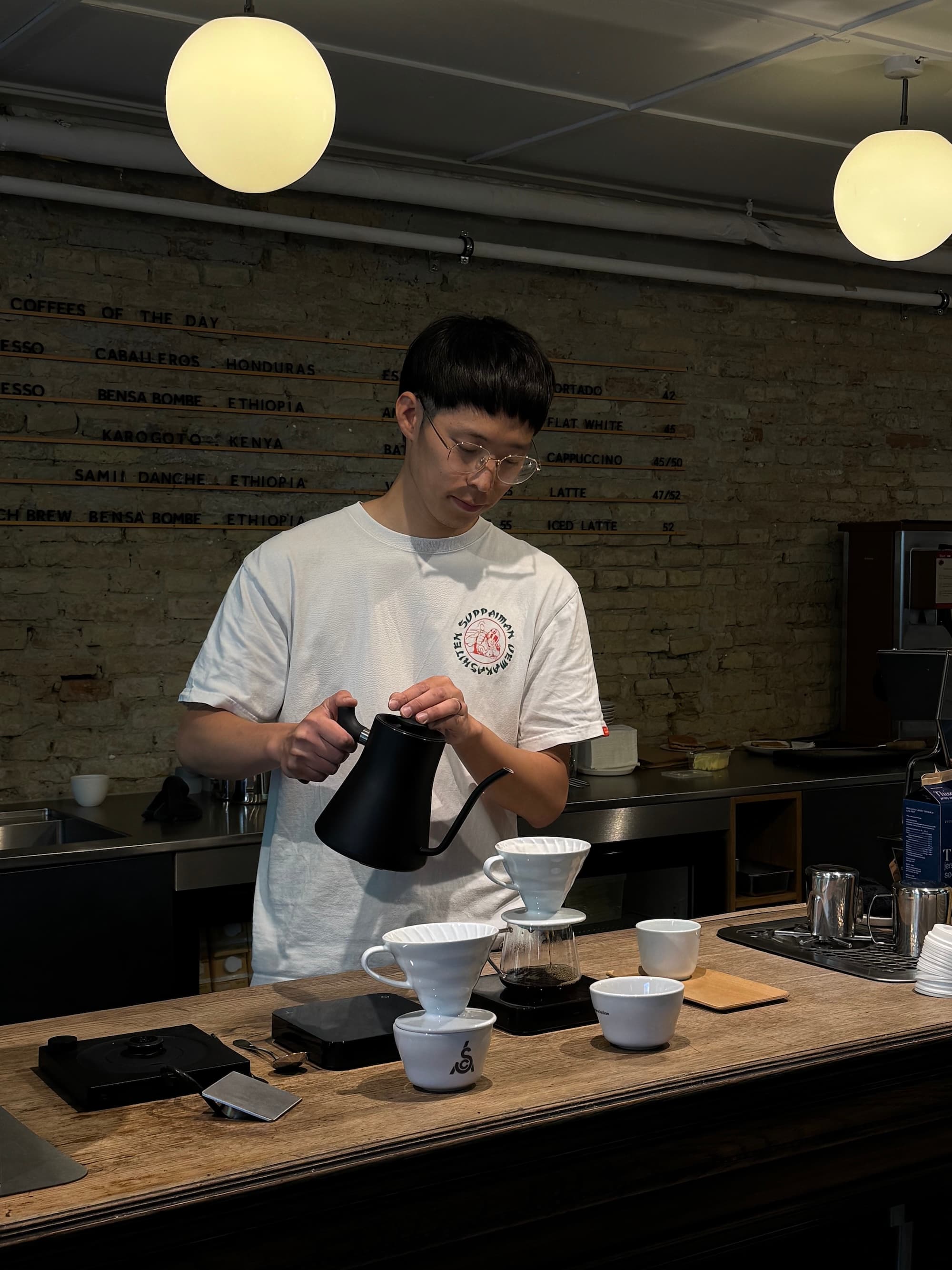 Masaki Haruta brewing pour-over coffee
